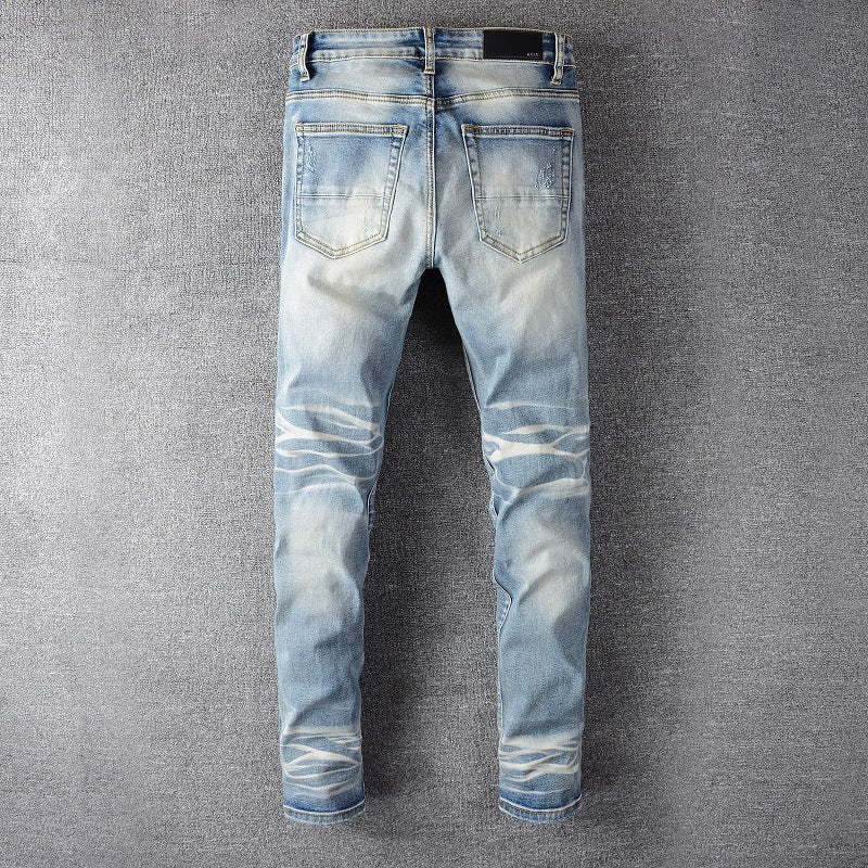 Tear Studded Denim Jeans